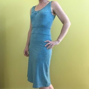 Blue-green sundress with funky print